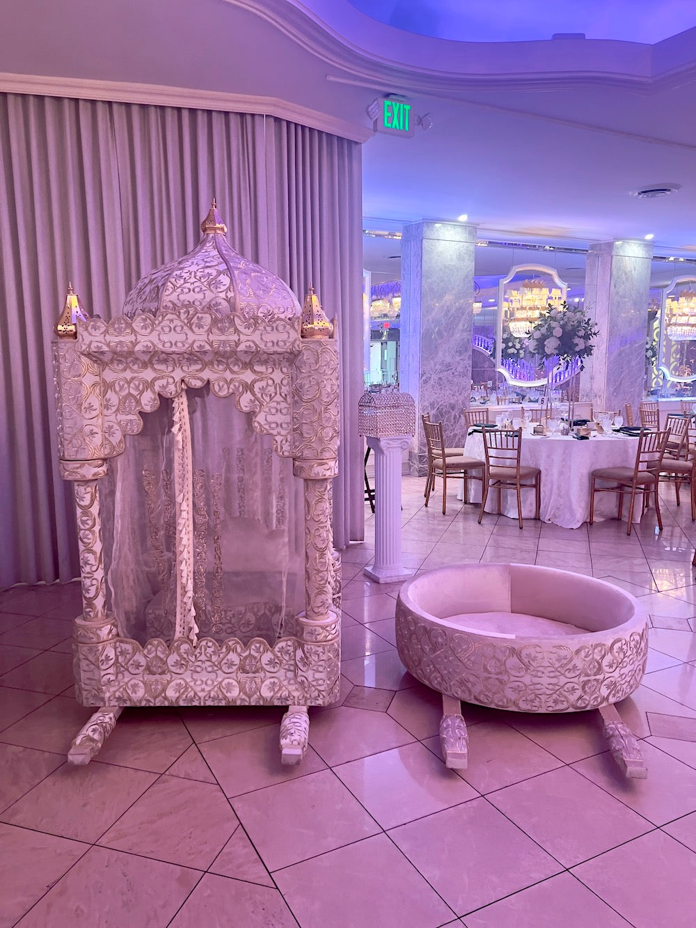 A Moroccan decorative seating arrangement with elegant furniture for Sheherazade Event's event rentals
